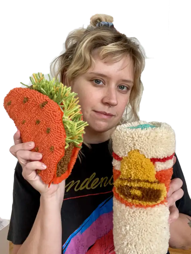 Angela mit getufteten 3D-Taco-Bell-Objekten